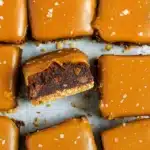 Pretzel Crusted Caramel Brownies with caramel layer and sea salt