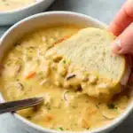 Vegan Mushroom Soup with Wild Rice in a rustic bowl