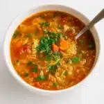 Best Cabbage Soup in rustic bowl with parsley garnish