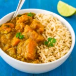 Butternut Squash and Coconut Curry in a bowl with rice