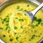 Green Enchiladas Chicken Soup in a bowl with toppings