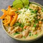 Bowl of Homemade White Chicken Chili with Toppings