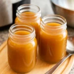 Slow Cooker Beef Bone Broth in Jar with Ingredients