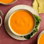 slow cooker carrot soup in rustic bowl