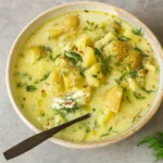 Chunky Potato Dill Soup served with fresh dill and potatoes