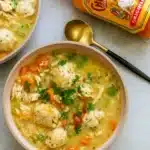 Creamy Chicken and Dumpling Soup in a cozy kitchen