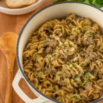 Easy Ground Beef Stroganoff in rustic bowl with noodles