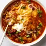 Easy Turkey Chili topped with cheese and sour cream