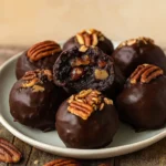 Pecan Pie Brownie Bombs dessert on rustic board
