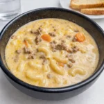 Cozy Cheeseburger Macaroni Soup in a rustic bowl