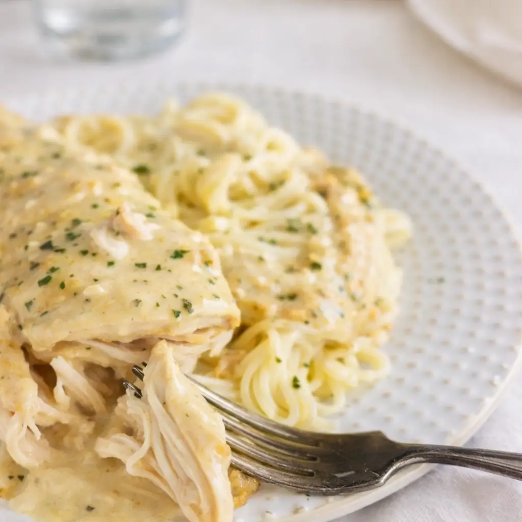 Crockpot Angel Chicken served over pasta