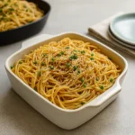 Garlic Sesame Noodles in bowl with toppings