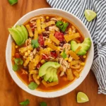 Healthy Crockpot Chicken Tortilla Soup with Toppings