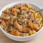 homemade chicken stroganoff served over egg noodles