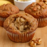 Low Calorie Greek Yogurt Banana Muffins cooling on table