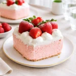 3 Ingredient No Bake Strawberry Cloud Cake on plate with strawberries