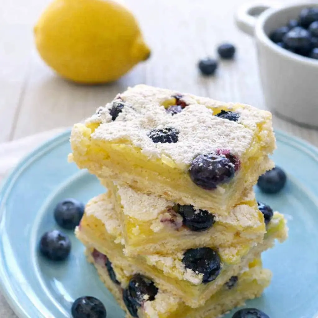 Blueberry Lemon Bars recipe with lemon and blueberries