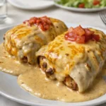 Cheesy Chicken Enchiladas with Creamy Sauce