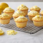 Keto Lemon Cream Cheese Muffins freshly baked on cooling rack