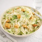 Pasta Caesar Salad creamy bowl with croutons and Parmesan