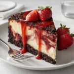 red velvet strawberry cheesecake with strawberry topping