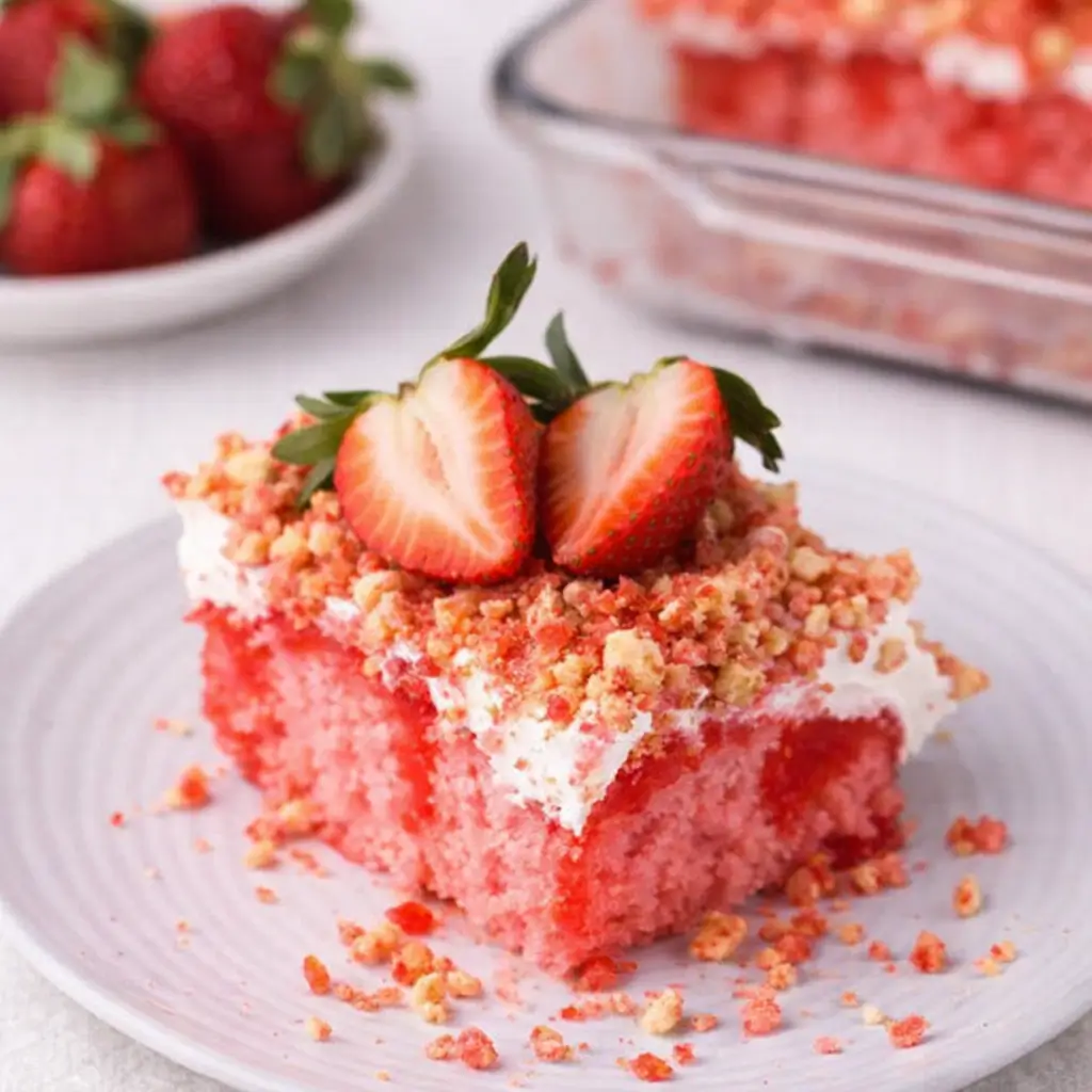 Strawberry Crunch Cake Recipe slice with fresh strawberries